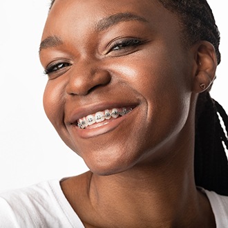 teen girl with traditional braces  