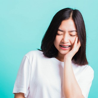 a patient suffering from oral pain