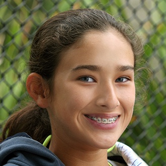 Teen girl with traditional braces