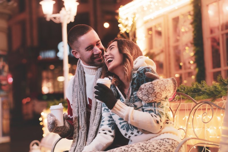 Couple laughing outside in the winter